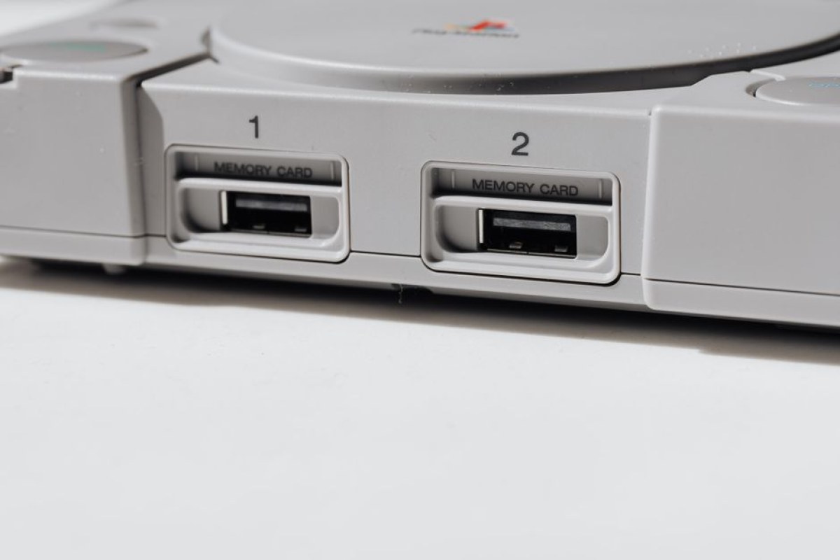 PlayStation console and game discs