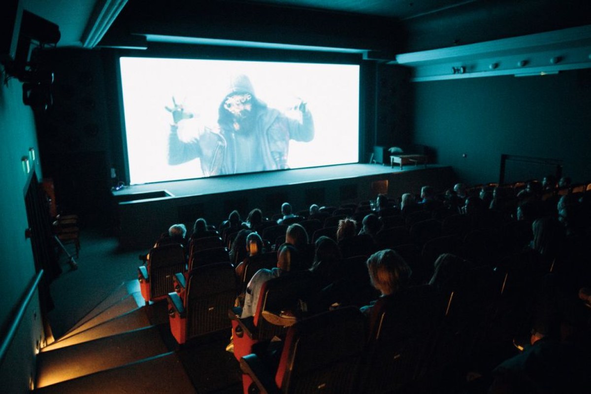 cinema audience watching horror